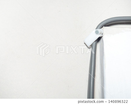 Fastening the wire to the wall. Ceiling mounting. Electric cord in the apartment. 220 volt. Fastening the wire to the wall. Ceiling mounting. Electric cord in the apartment. 220 volt. 140896322