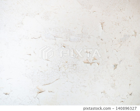 Ceiling of an old apartment. Crumbling plaster. The housing requires renovation. Background made of peel-off coating. Ceiling of an old apartment. Crumbling plaster. The housing requires renovation. Background made of peel-off coating. 140896327