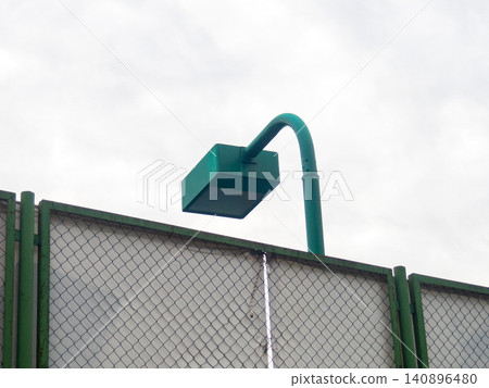 Brutal lamp over the sports ground. Modern lighting. Lantern in the park. Rectangular shape. 140896480