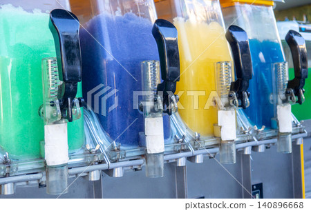 Vending machine with soft drinks and ice. Levers of a water machine Vending machine with soft drinks and ice. Levers of a water machine 140896668
