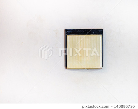 Old plastic wall light switch. Vintage device. Part of home interior. Old plastic wall light switch. Vintage device. Part of home interior. 140896750