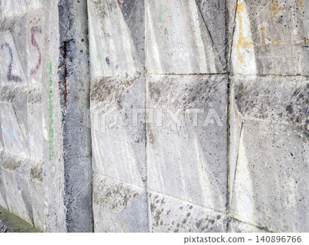 Concrete wall background. Pattern on a concrete fence. Industrial zone. Gray stone background. Concrete wall background. Pattern on a concrete fence. Industrial zone. Gray stone background. 140896766