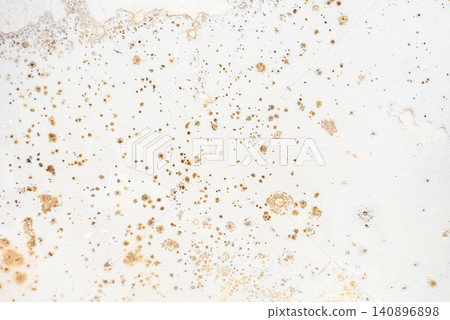 Mold on the surface of the bathroom. Dark mold close-up on bathroom enamel. Dirty white surface. Mold on the surface of the bathroom. Dark mold close-up on bathroom enamel. Dirty white surface. 140896898