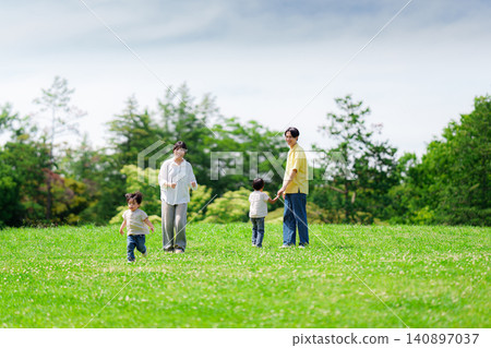 Families playing in the park Families playing in the park 140897037