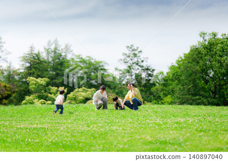 Families playing in the park Families playing in the park 140897040