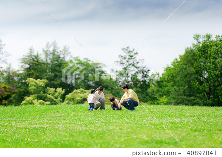 Families playing in the park Families playing in the park 140897041
