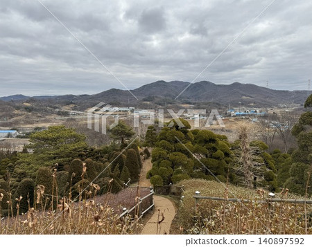 Panoramic view of Korean bonsai garden overlooking Winter Valley Panoramic view of Korean bonsai garden overlooking Winter Valley 140897592