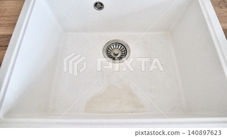 Dirty White Artificial Stone Kitchen Sink with Metal Drain Top View Dirty White Artificial Stone Kitchen Sink with Metal Drain Top View 140897623