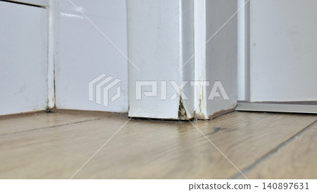 Swollen Bathroom Door Frame Damaged by Moisture Swollen Bathroom Door Frame Damaged by Moisture 140897631