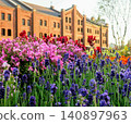 Flowers and red brick warehouse 140897963