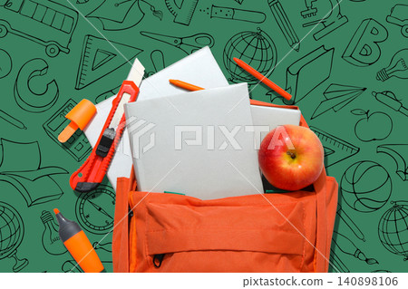 Back to school, Backpack filled with school supplies and an apple ready for learning Back to school, Backpack filled with school supplies and an apple ready for learning 140898106