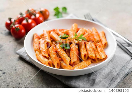 Bowl of spicy kimchi and pork belly slices on gray table Bowl of spicy kimchi and pork belly slices on gray table 140898193