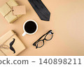 Desk with coffee, glasses, notebook, pen, and phone 140898211