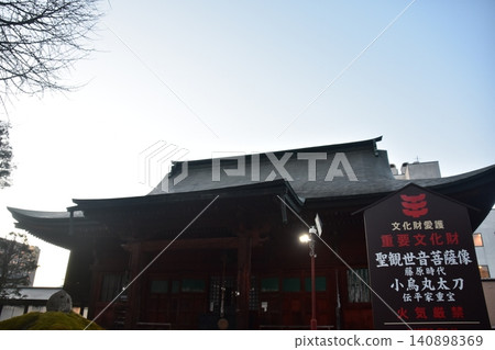 Hida Kokubunji Temple and the surrounding townscape in Takayama City, Gifu Prefecture. The main hall where the statue of the Holy Kannon Bodhisattva is enshrined. A morning scene during the spring Takayama Festival. 140898369