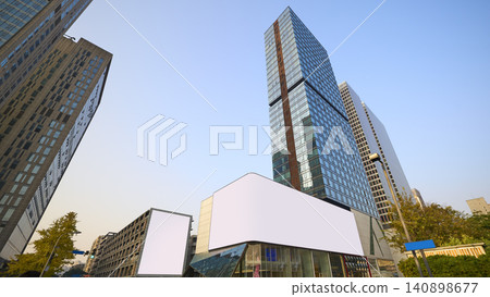 Modern city downtown with blank billboards and skyscrapers 140898677