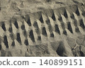 Sand tire tracks 140899151