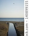 People gazing at the coastal waterway and the sea. 140899155