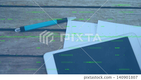 Showing tablet with green overlay on worn wooden table, turquoise pen, two white sheets, copy space 140901807