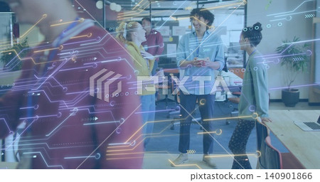Discussing team wearing casual attire, gesturing at desk in office with laptop and AR overlay Discussing team wearing casual attire, gesturing at desk in office with laptop and AR overlay 140901866