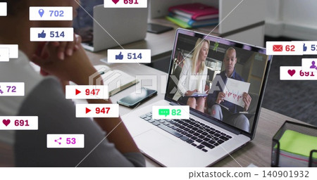 Viewing laptop screen with presenters in blazer holding chart at desk, with reactions, copy space Viewing laptop screen with presenters in blazer holding chart at desk, with reactions, copy space 140901932