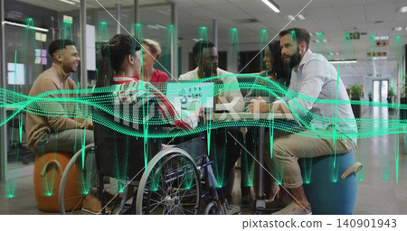 Discussing biz-casual team leaning at round table in office nook with wheelchair laptop AR waveform Discussing biz-casual team leaning at round table in office nook with wheelchair laptop AR waveform 140901943
