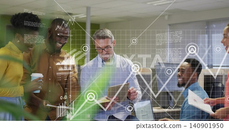 Reviewing charts team leader wearing business attire guiding project review in office with tablet 140901950