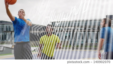 Jumping man in blue athletic shirt and gray shorts shooting basketball on outdoor court, copy space Jumping man in blue athletic shirt and gray shorts shooting basketball on outdoor court, copy space 140902070