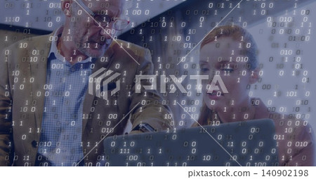 Pointing man in glasses and woman in dark blazer viewing laptop in office, showing binary overlay Pointing man in glasses and woman in dark blazer viewing laptop in office, showing binary overlay 140902198