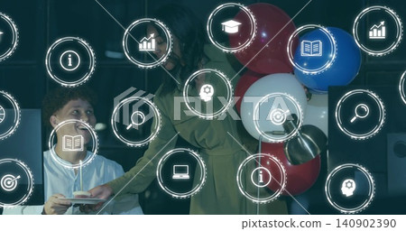 Leaning coworkers at office desk, olive dress holding candle-topped cupcake, HUD icons and balloons Leaning coworkers at office desk, olive dress holding candle-topped cupcake, HUD icons and balloons 140902390