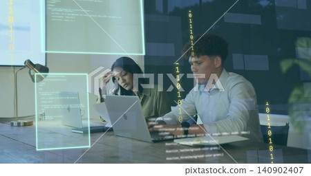 Collaborating two coworkers in button shirts typing and reading at office table, with laptops code Collaborating two coworkers in button shirts typing and reading at office table, with laptops code 140902407