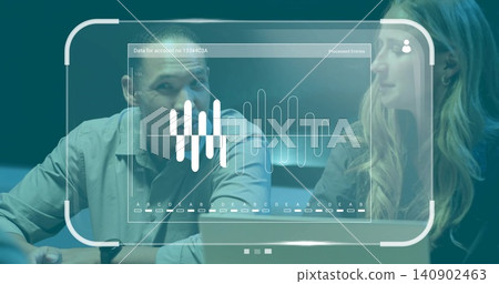 Reviewing man in light button-up and woman in dark jacket analyzing holographic HUD in office Reviewing man in light button-up and woman in dark jacket analyzing holographic HUD in office 140902463