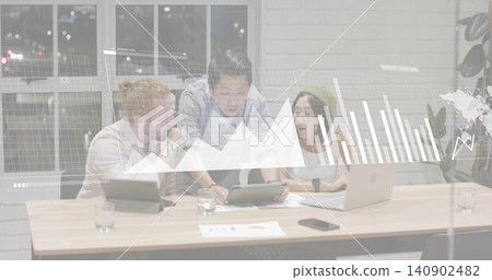Analyzing data, three colleagues wearing business attire leaning in office, with tablet and laptop Analyzing data, three colleagues wearing business attire leaning in office, with tablet and laptop 140902482