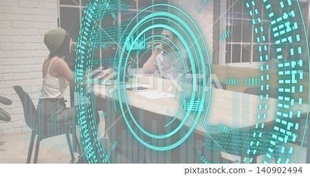 Projecting cyan AR circular interface hovering over office meeting table, beanie woman gesturing Projecting cyan AR circular interface hovering over office meeting table, beanie woman gesturing 140902494