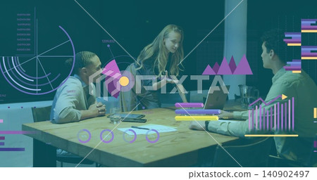 Presenting woman wearing business attire leaning over wooden table at office, with laptop charts Presenting woman wearing business attire leaning over wooden table at office, with laptop charts 140902497