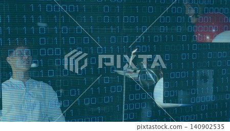 Recording woman with glasses, button-up and man in red top working in dark studio, binary code Recording woman with glasses, button-up and man in red top working in dark studio, binary code 140902535