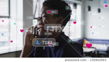 Smiling woman in dark blouse holding phone at bright office with social media alerts, copy space Smiling woman in dark blouse holding phone at bright office with social media alerts, copy space 140902663