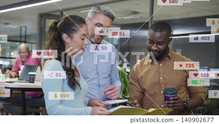 Reviewing team of three in business clothes viewing tablet, yellow file at open office, alerts Reviewing team of three in business clothes viewing tablet, yellow file at open office, alerts 140902677