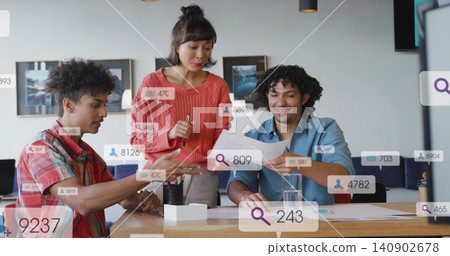 Discussing team in coral sweater and shirts reviewing documents in meeting room, with overlays Discussing team in coral sweater and shirts reviewing documents in meeting room, with overlays 140902678