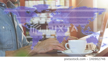 Typing man in denim shirt using laptop at sunlit cafe table, with coffee cup, purple map Typing man in denim shirt using laptop at sunlit cafe table, with coffee cup, purple map 140902746