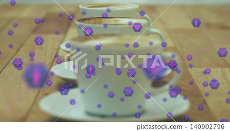 Displaying three white ceramic cups with crema on saucers sitting on wood table, purple hex icons 140902796