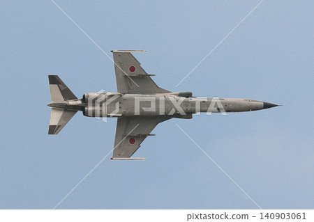 Japan Air Self-Defense Force F-1 fighter jets flying overhead 140903061
