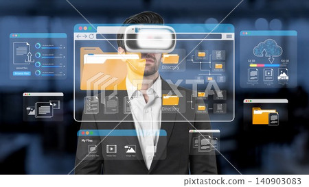 A smartly dressed businessman using virtual reality technology, showcasing digital file interfaces and intricate data management visuals in a modern workspace setting. Sigmoid A smartly dressed businessman using virtual reality technology, showcasing digital file interfaces and intricate data management visuals in a modern workspace setting. Sigmoid 140903083
