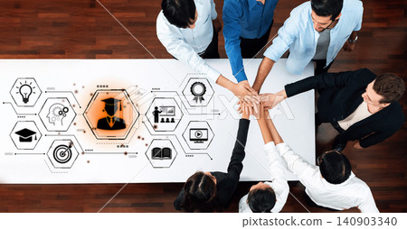 Team Collaboration in a Modern Office Setting with Education and Achievement Icons on a White Table to Symbolize Growth and Learning. Bitwise Team Collaboration in a Modern Office Setting with Education and Achievement Icons on a White Table to Symbolize Growth and Learning. Bitwise 140903340