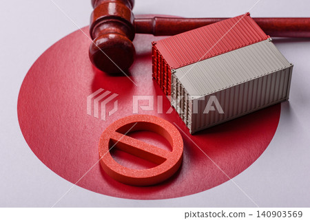 The cargo container ban on the japanese flag as a conceptual backdrop. The cargo container embargo The cargo container ban on the japanese flag as a conceptual backdrop. The cargo container embargo 140903569