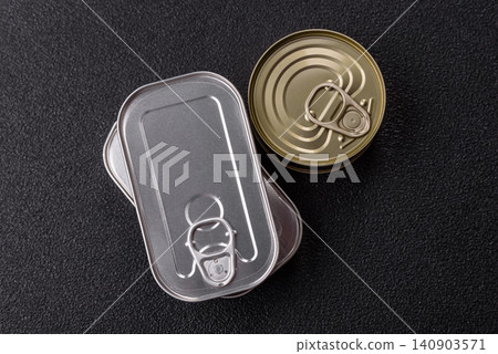 A metal tin can of meat, fish, or dog or cat food. A tin can of food 140903571