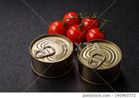 A metal tin can of meat, fish, or dog or cat food. A tin can of food A metal tin can of meat, fish, or dog or cat food. A tin can of food 140903572