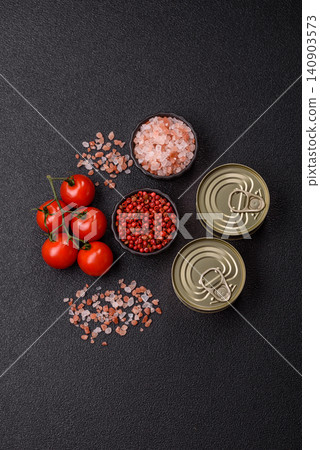 A metal tin can of meat, fish, or dog or cat food. A tin can of food 140903573