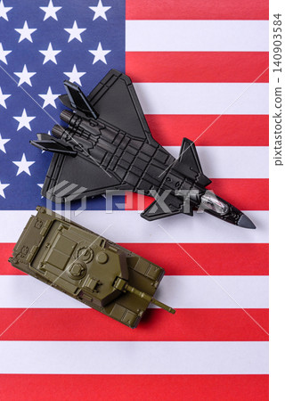 A fighter jet against the US flag as a conceptual background representing defense A fighter jet against the US flag as a conceptual background representing defense 140903584