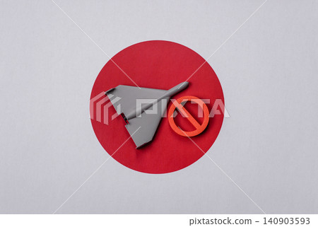 A Shahed drone featuring a prohibition symbol on the Japanese flag as a conceptual background 140903593