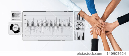 Team Collaboration with Hands Over Graphs and Data Visualizations Showing Business Growth and Partnership Success in Corporate Environment Trope Team Collaboration with Hands Over Graphs and Data Visualizations Showing Business Growth and Partnership Success in Corporate Environment Trope 140903624